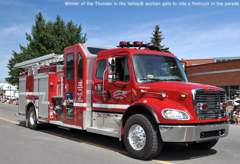Winner of the Thunder in the Valley auction gets to ride a firetruck in the parade