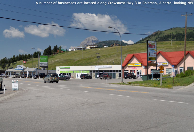 A number of businesses are located along Crowsnest Hwy 3 in Coleman, Alberta; looking NW